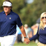 Amy Mickelson With Phil Supporting His Game