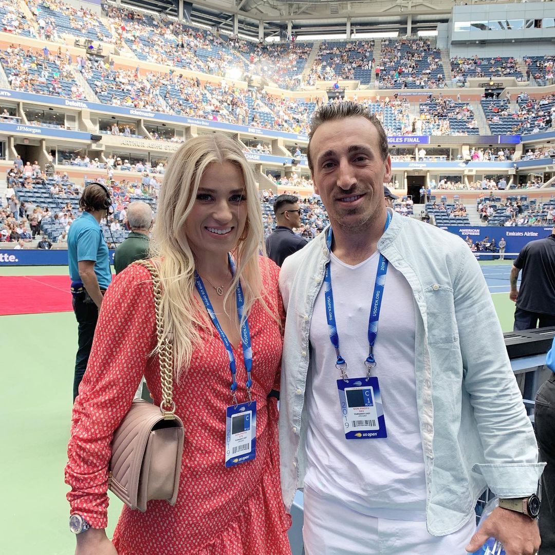 Brad Marchand and his wife Katrina at a stadium 