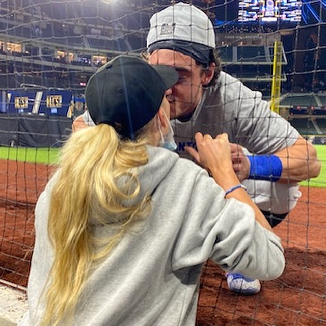 Cody Bellinger and Chase Carter kissing each other post game ( Source: Instagram)