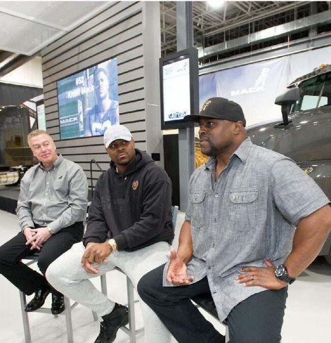 Khalil Mack's father and son at Mack Trucks