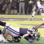 Mike Jones tackles Kevin Dyson just one yards ahead of end line