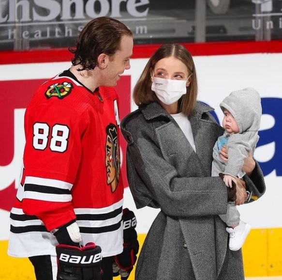 Patrick Kane with his wife Amanda and son Patrick Kane III at Kane's honor ceremony for his 1000th NHL Game in March 23, 2021. ( Source: herald.com)