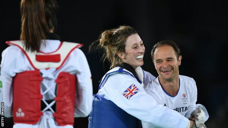 Jade Jones celebrating her old win at 2016 Rio Olymoics with coach Paul Green. (Source: bbc.com)