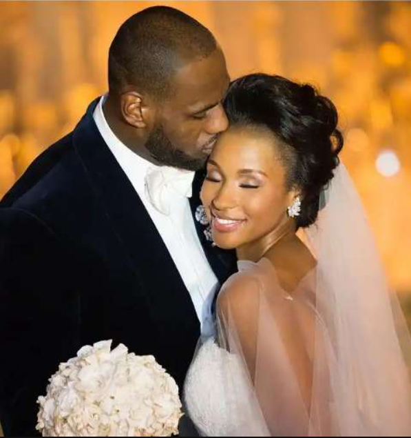 LeBron James and Savannah Brinson in their wedding.