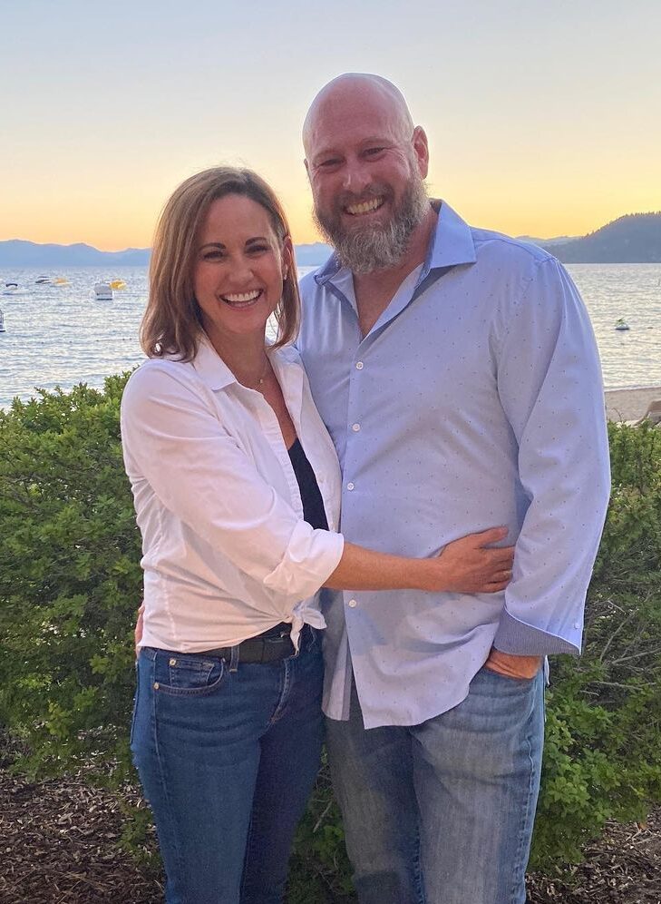 Trent Dilfer's wife and Trent himself giving a beautiful smile for the camera