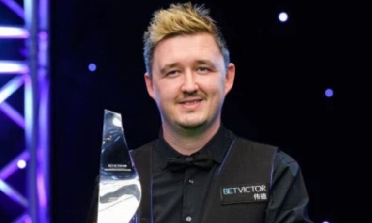 Kyren Wilson smiling with his just won trophy