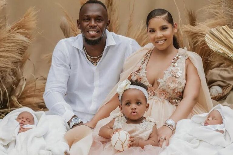 Usain Bolt and Kasi Bennett with their children
