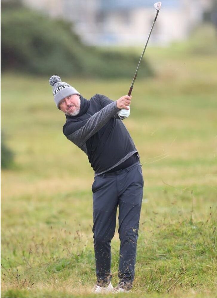 Stephen Hendry playing golf