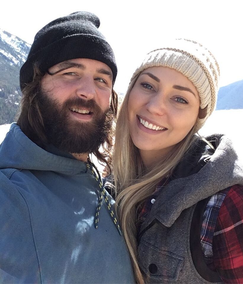 Cody McKenzie with his wife Lindsey Jenkins McKenzie in a snowy terrain