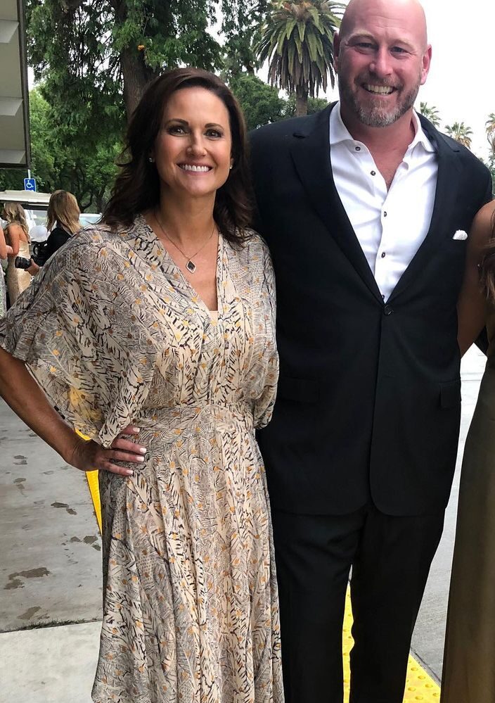 Trent Dilfer's wife and her husband attending an event