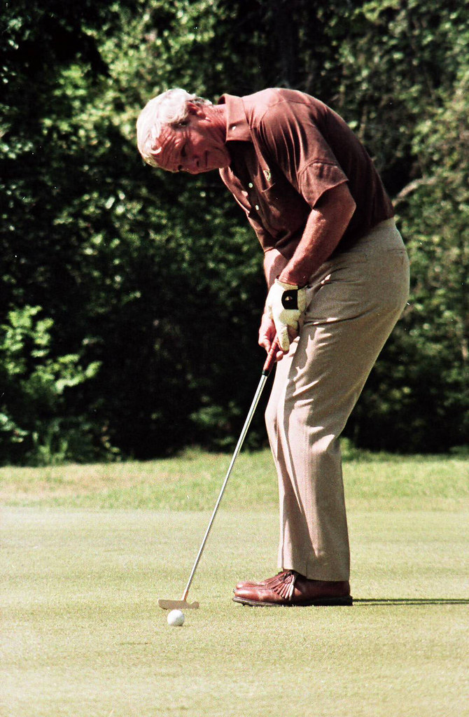 Arnold Palmer playing golf