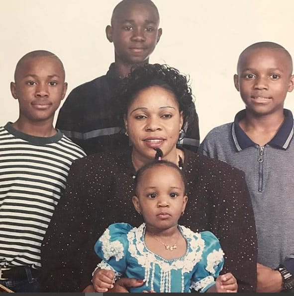 Kamaru Usman with his mother and his siblings