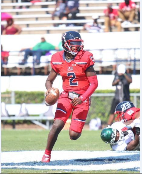 Shedeur Sanders Playing a football