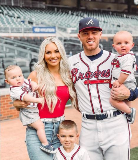 Chelsea with her husband and children.