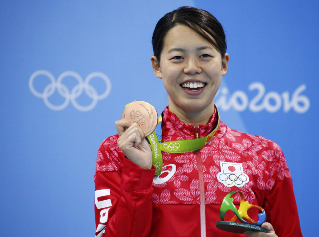 Natsumi Hoshi with her bronze medal, which she earned in 200m Butterfly swimming in the 2016 Rio Olympics