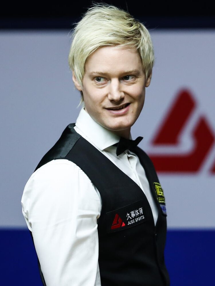 Neil Robertson with grinning as if he knows he is about the end his opponents whole career