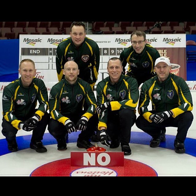Brad Jacobs with team