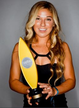 Coco holding the SURFER Poll award