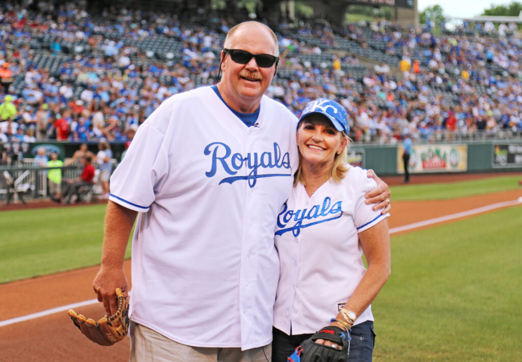 Andy and Tammy are wearing the jersey of the Kansa City Royals and supporting the team