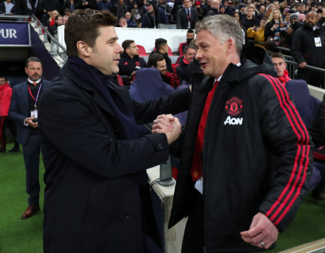 Ole Gunnar Solskjaer with Mauricio Pochettino