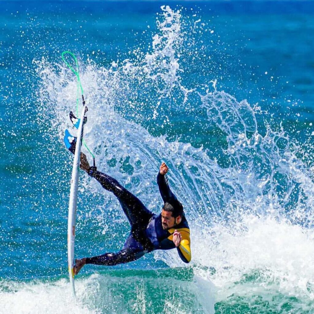 Adriano de Souza while surfing