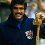 Mark Spitz Holding Five Gold Medals