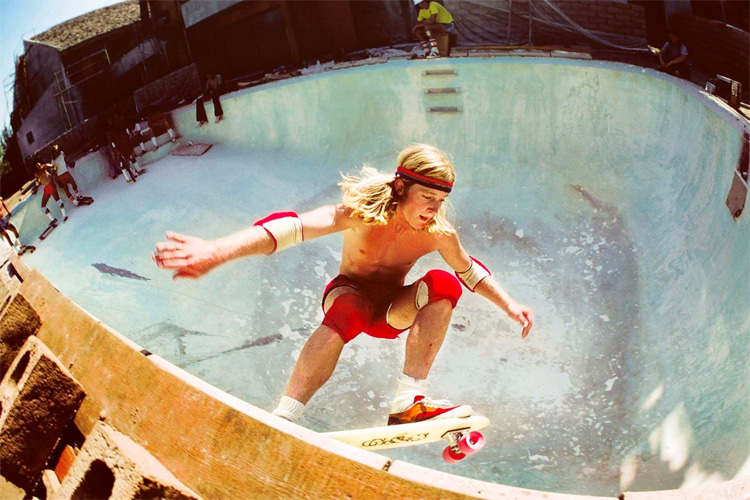 Stacy Peralta showing his skateboarding trick