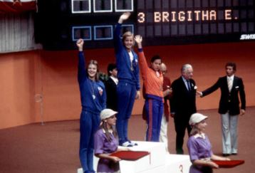 Kornelia Ender (in the middle) waved to fans after receiving a gold medal at Montreal Olympic Games in 1976