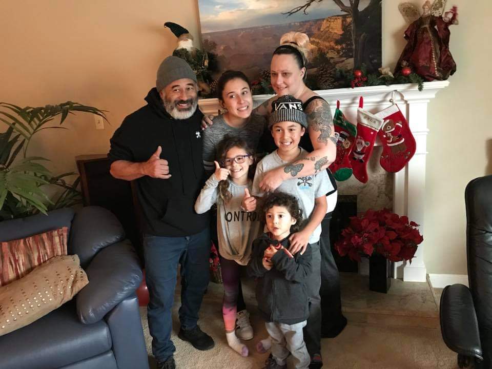 Steve Caballero with his wife and children.