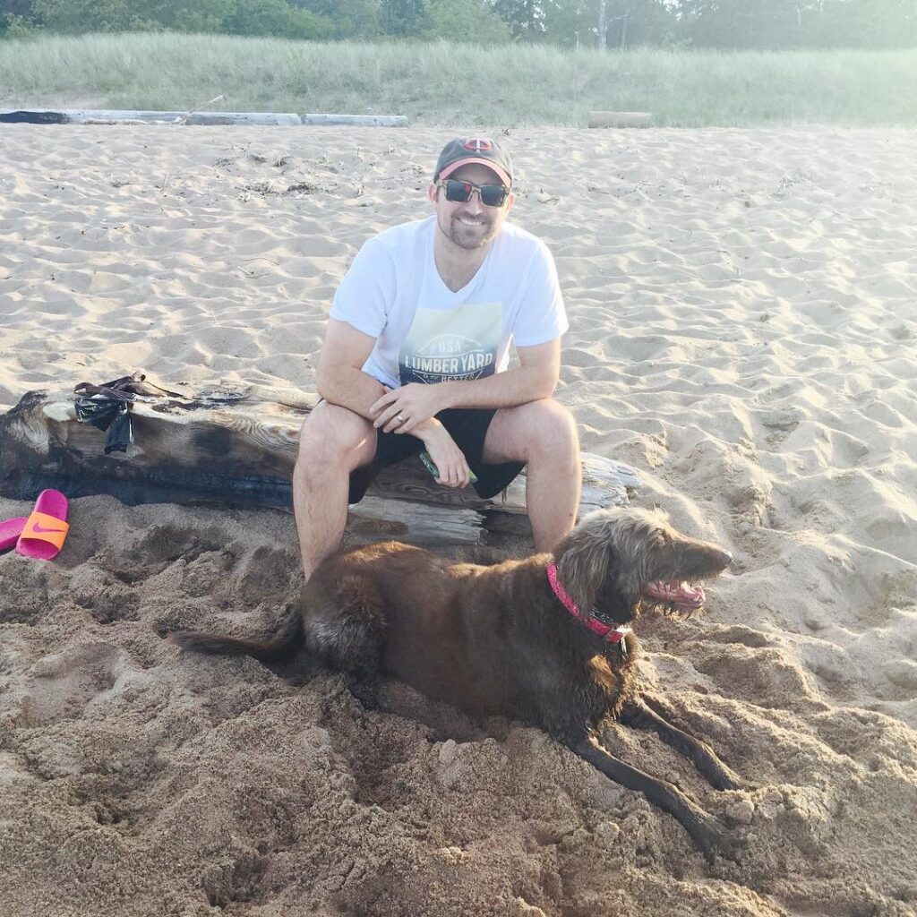 Joe Polo with his dog at the beach (Source: Instagram)