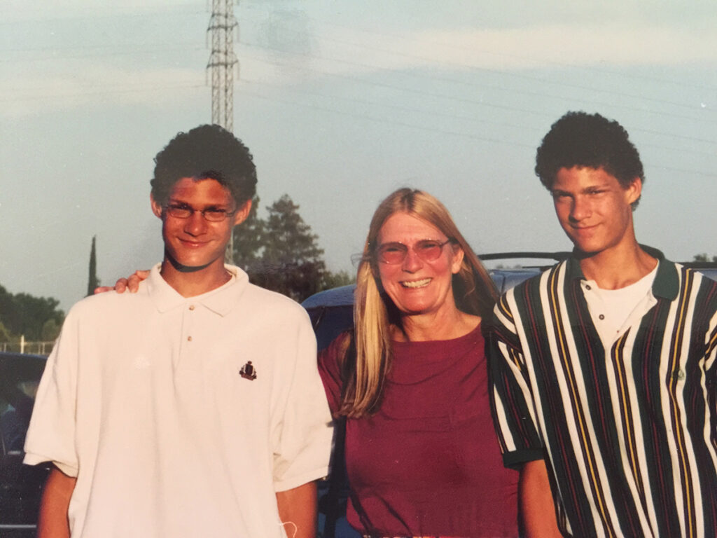 Brook Lopez with his twin brother Robin Lopez & mother (Source: Milwaukeemag.com)