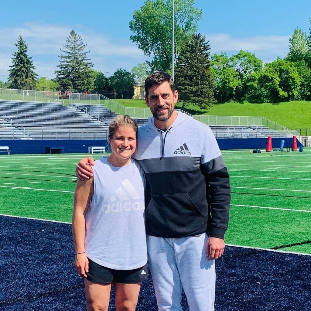 NWHL Star With NFL Star Aaron Rodgers