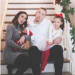 Daniel Theis with his wife and children