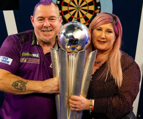 Peter Wright with his wife