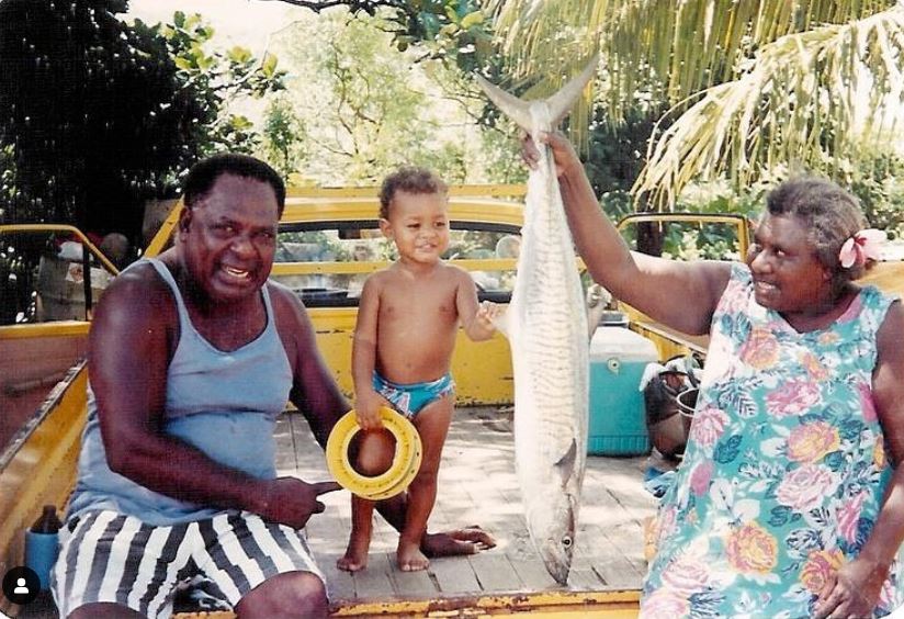 Young Patty Mills goes fishing with his grandparents