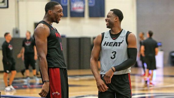 Bam (left) with his teammate, Dwayne Wade