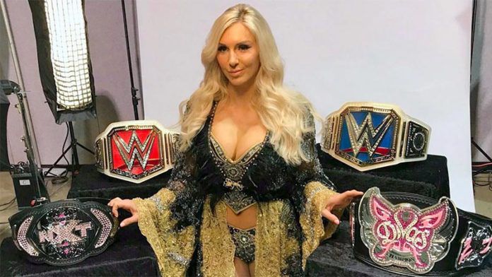  Flair with all the titles she has won in WWE.