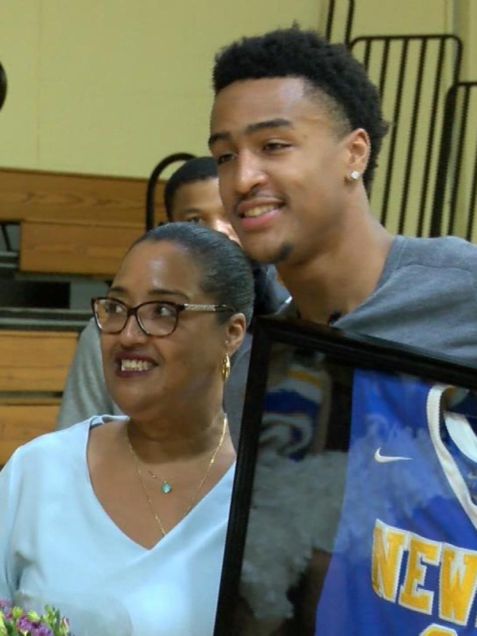 John Collins with his mother (Source: WPEC)