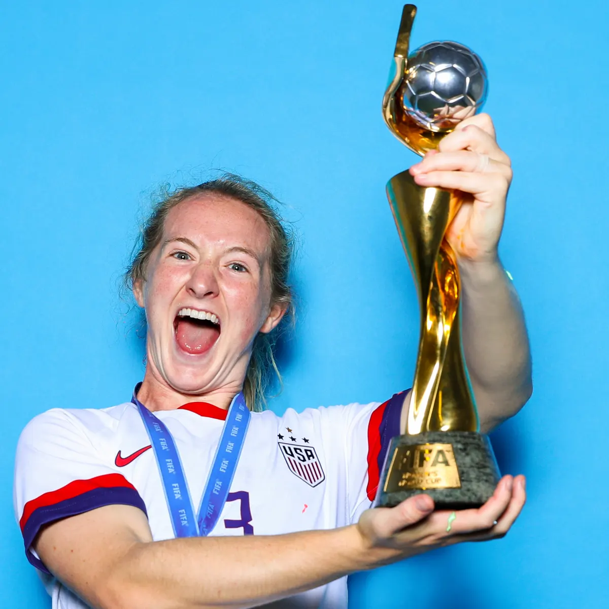 Mewis With The Women's World Cup Trophy