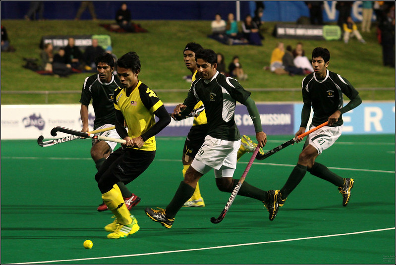 Pakistani players playing against Malayisa