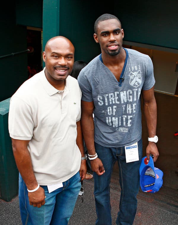 Tim Jr. with his father (Source: The New York Times)