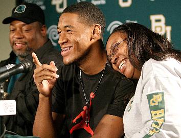 Young Jones seen having a joyous moment with his mom(Source: Waco Tribune-Herald)