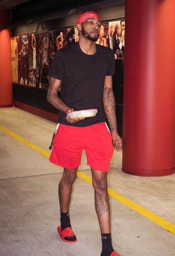 Derrick Jones body is carved with tattoos