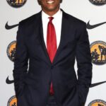 Sean Elliott Attending An Event