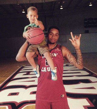 Shawn Long with his son Jace (Source: CBS Sports)
