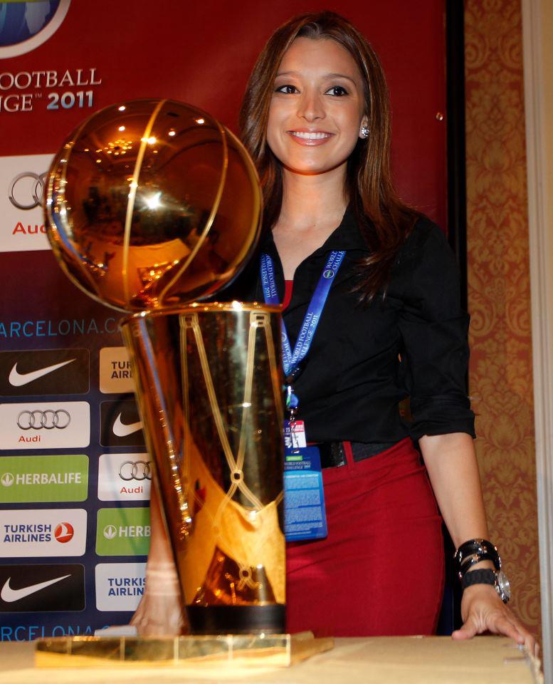 Antonietta Posing With The NBA Trophy