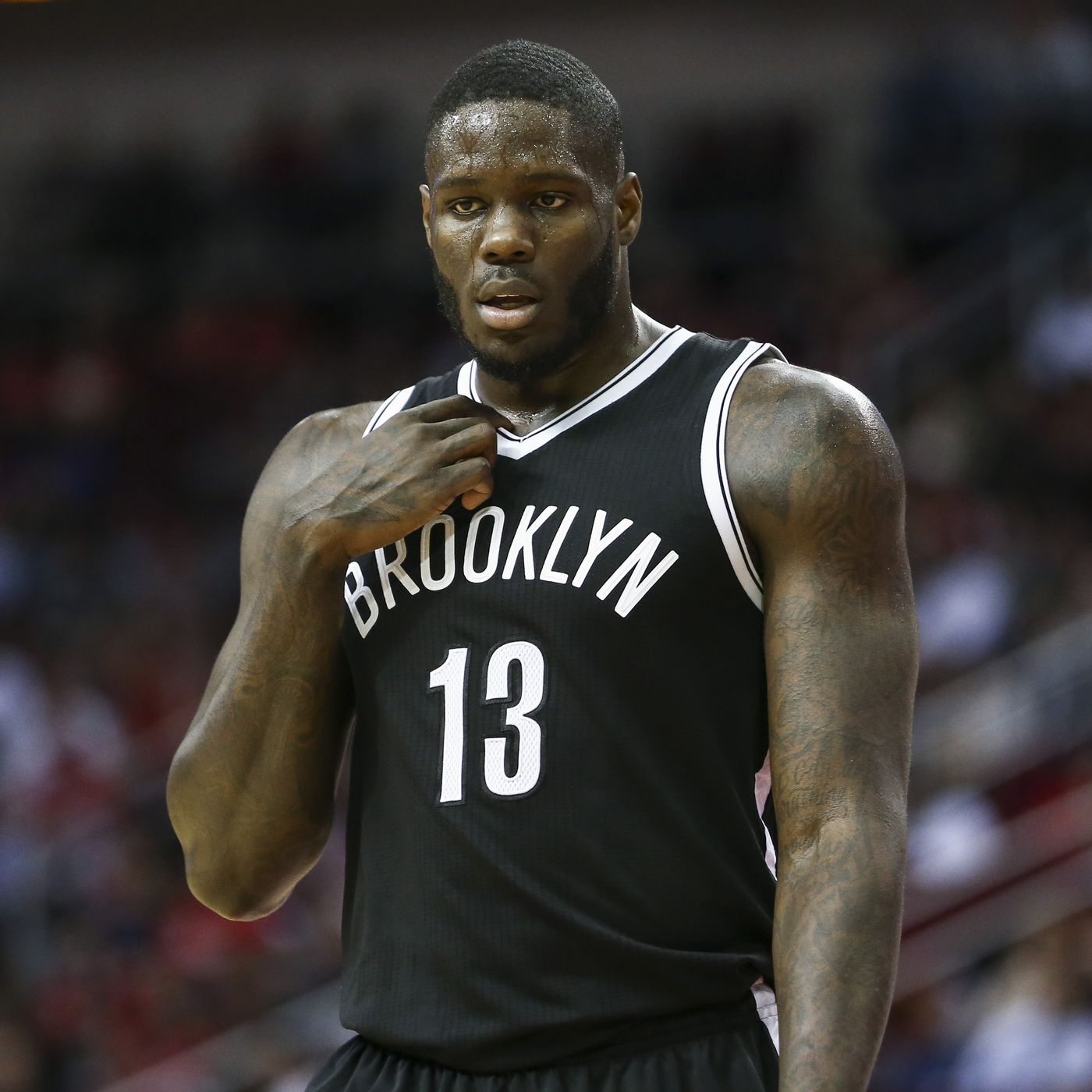 Anthony Bennett in a number 13 black jersey of the Brooklyn Nets