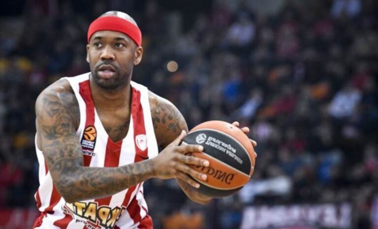 Bobby Brown holding basketball