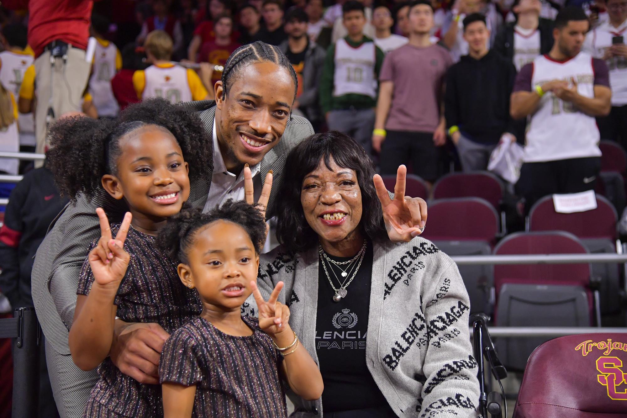 DeMar With His Mother And Daughters