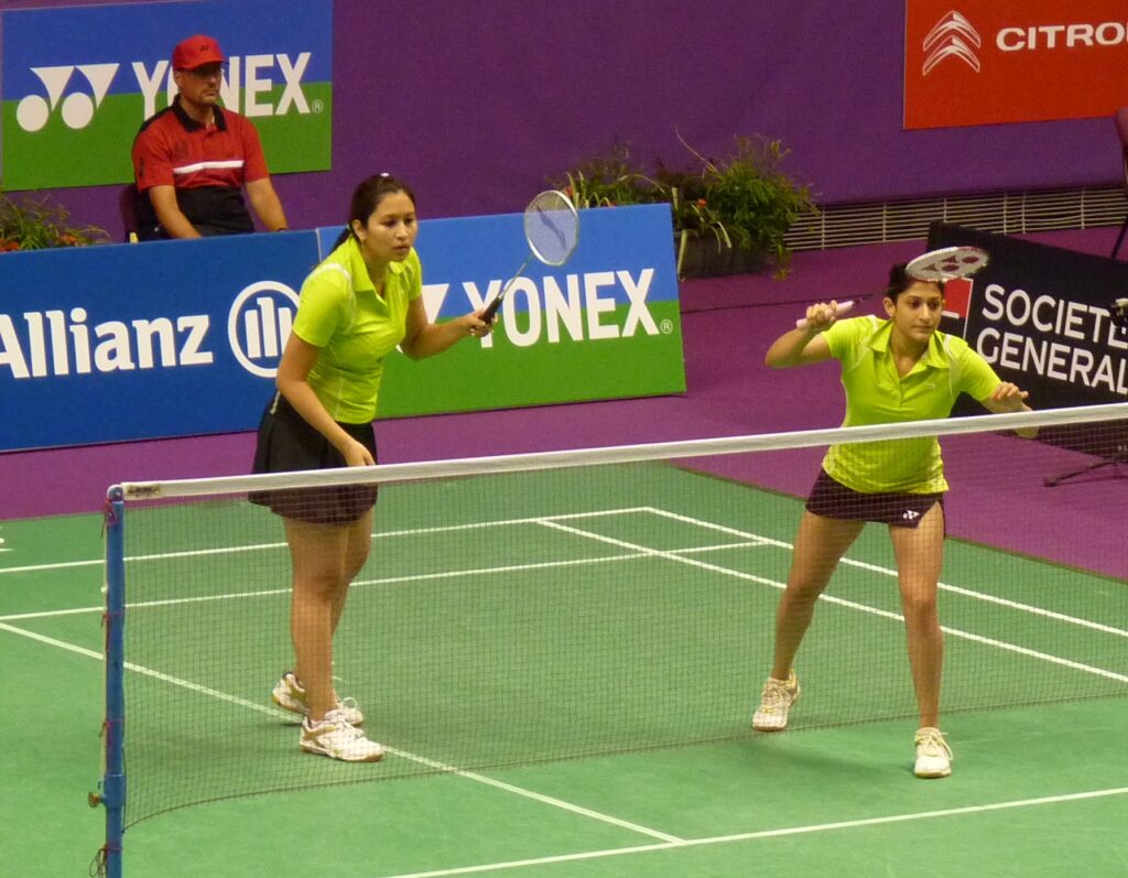 Jwala Gutta & Ashwini Ponnappa in an international Badminton match (Source: Wikimedia)